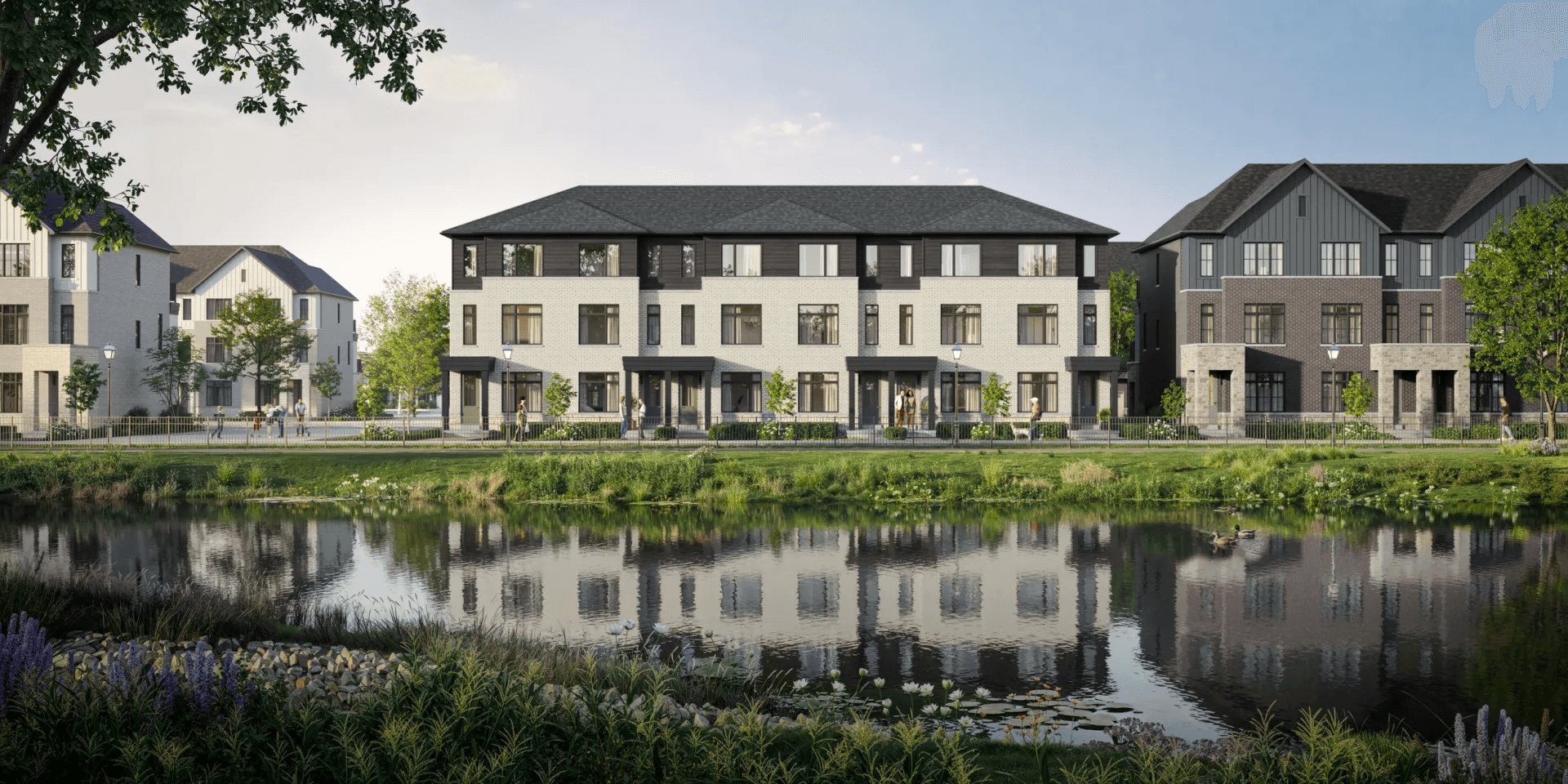 Artist's concept of Cornerstone townhomes beside a landscaped pond.